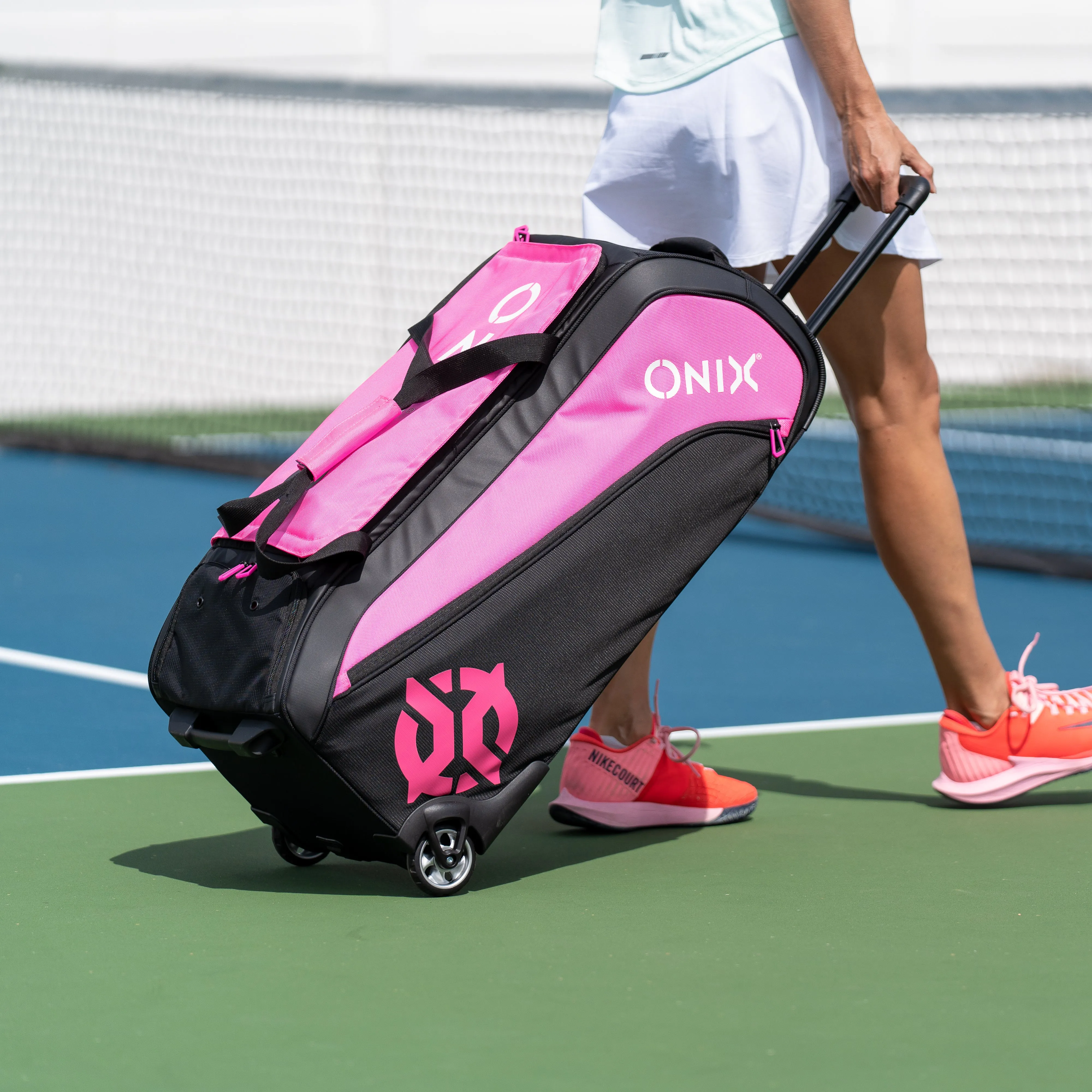 Pro Team Pink Wheeled Duffel Bag