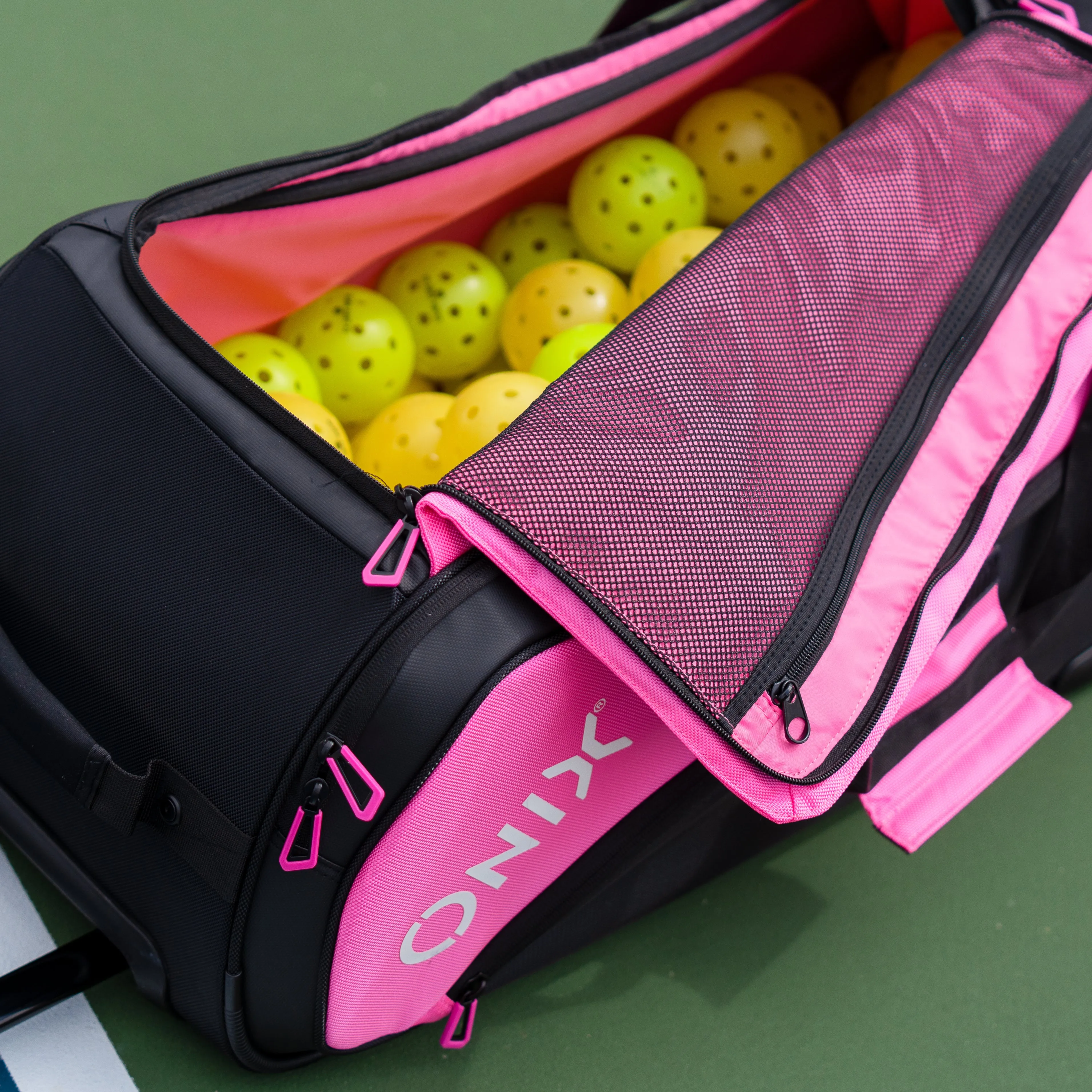 Pro Team Pink Wheeled Duffel Bag